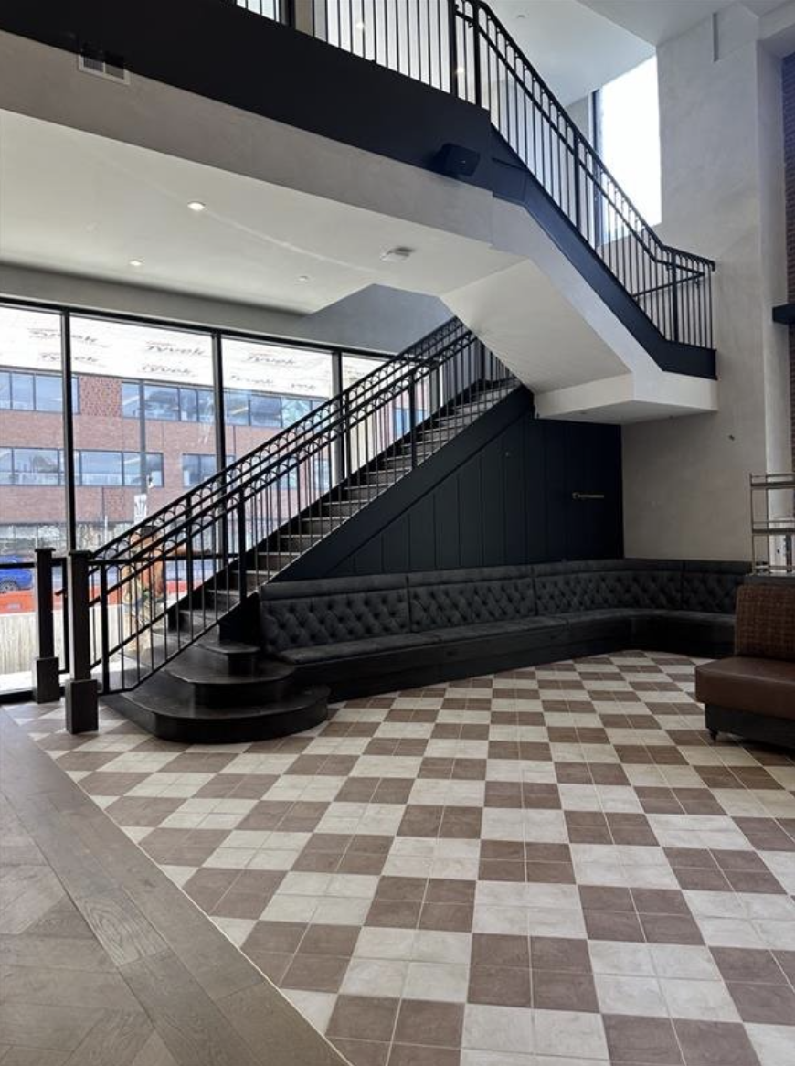 Staircase to the study mezzo in the Rambler Columbus lobby.